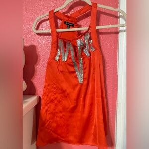 Red Sleeveless Top with Silver Accents
